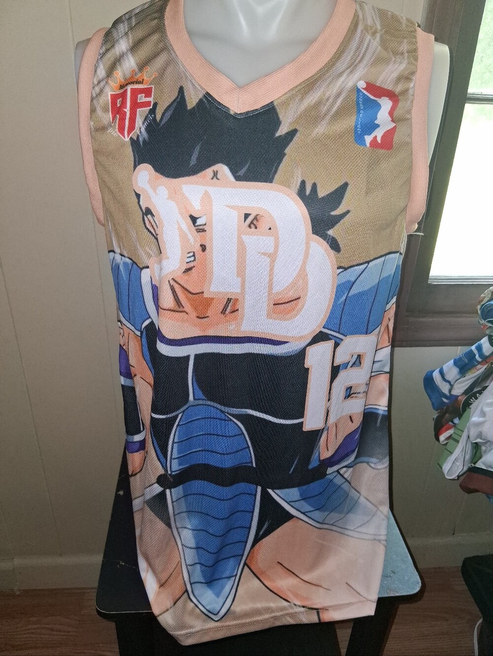 Men's Sleeveless Anime Graphic Jersey in Tan and Blue